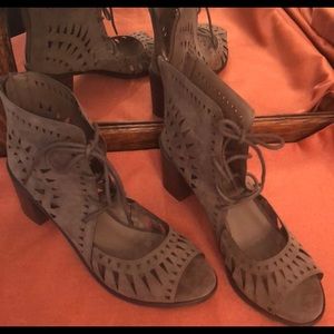 New Breckelle’s tan suede peep toe lace up sandal.